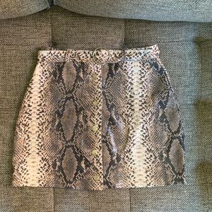 Snakeskin button up mini skirt